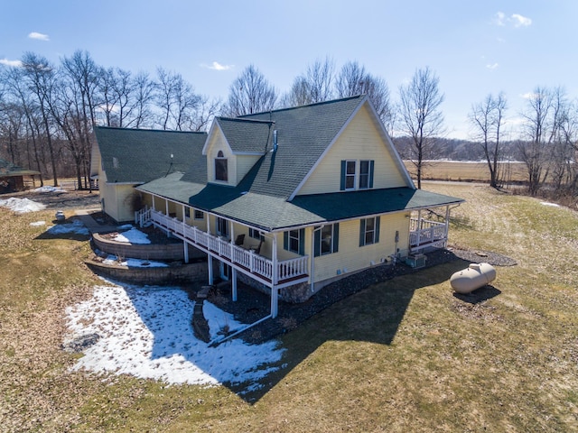 1757 325th Ave, West Sweden Twp, WI 54837 - back of property with covered porch, a yard, and roof with shingles