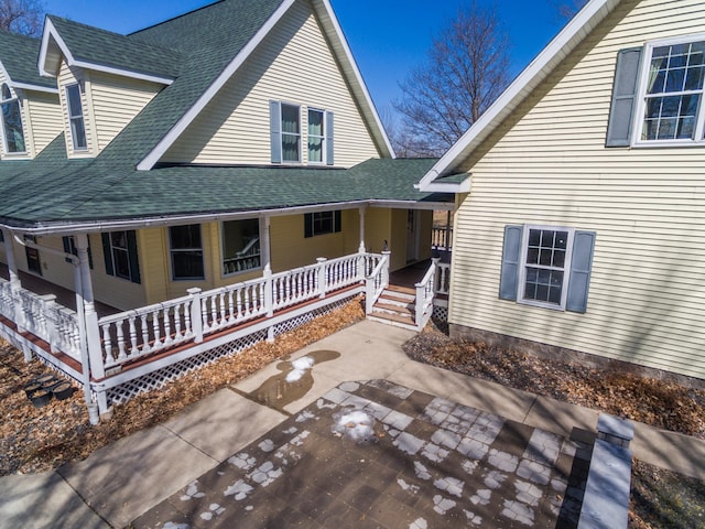 1757 325th Ave, West Sweden Twp, WI 54837 - view of front of home featuring covered porch and roof with shingles