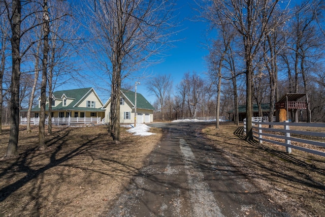 1757 325th Ave, West Sweden Twp, WI 54837 - view of property exterior featuring a porch and driveway
