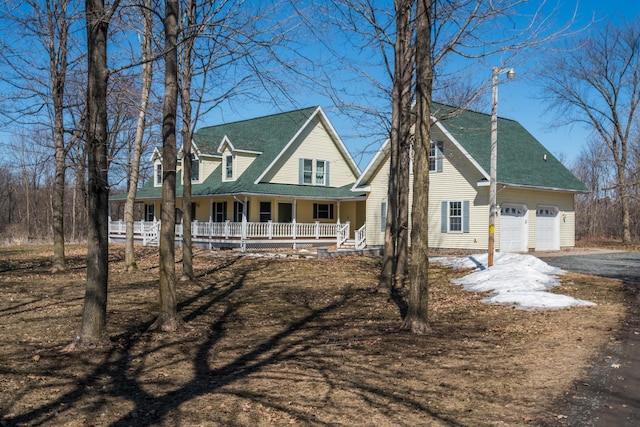 1757 325th Ave, West Sweden Twp, WI 54837 - view of front of home with a porch, a garage, and roof with shingles