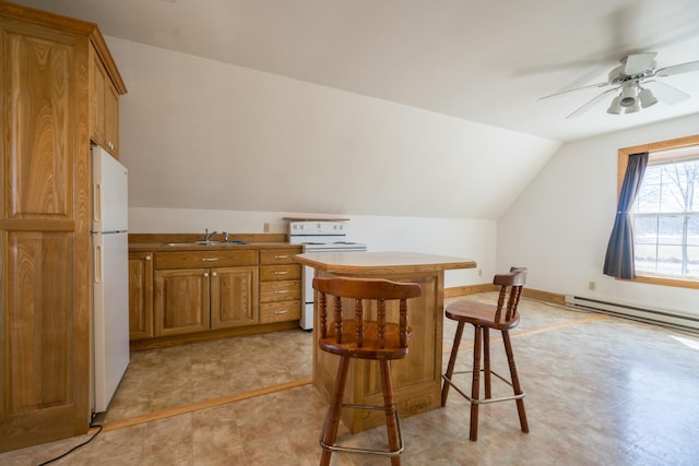 1757 325th Ave, West Sweden Twp, WI 54837 - kitchen featuring white appliances, brown cabinetry, ceiling fan, vaulted ceiling, and a baseboard radiator