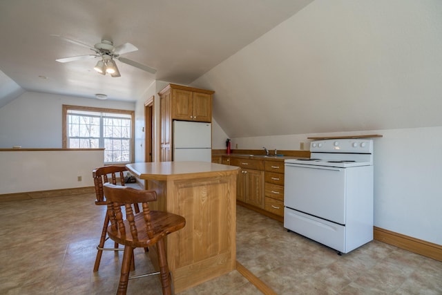 1757 325th Ave, West Sweden Twp, WI 54837 - kitchen with white appliances, vaulted ceiling, a center island, a kitchen breakfast bar, and ceiling fan