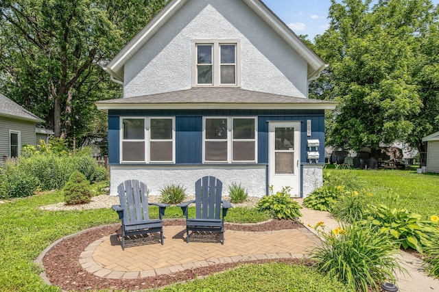 619 4th Ave E, Shakopee, MN 55379 - rear view of property featuring a yard and a patio area