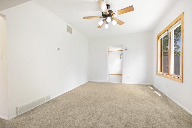 619 4th Ave E, Shakopee, MN 55379 - unfurnished room featuring carpet floors and ceiling fan