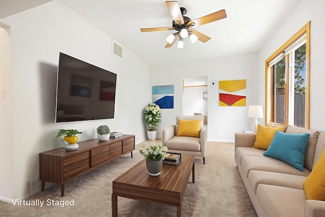 619 4th Ave E, Shakopee, MN 55379 - carpeted living area with ceiling fan and baseboards