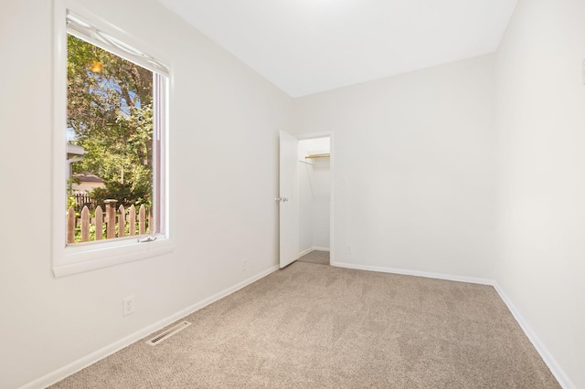 619 4th Ave E, Shakopee, MN 55379 - empty room with light carpet and baseboards