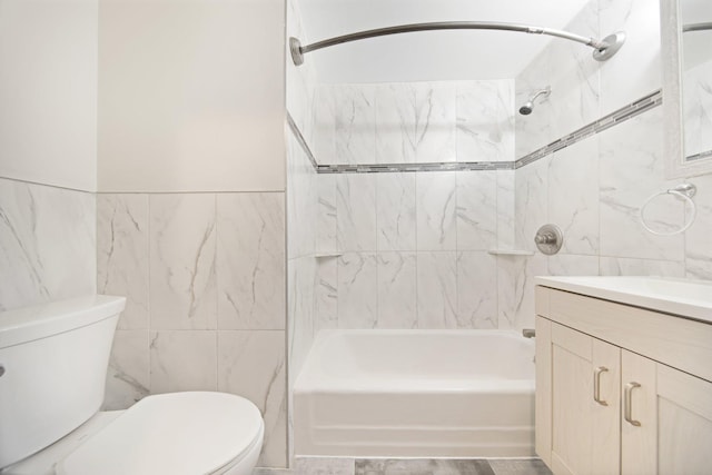 619 4th Ave E, Shakopee, MN 55379 - bathroom featuring tile walls, vanity, and shower / tub combination