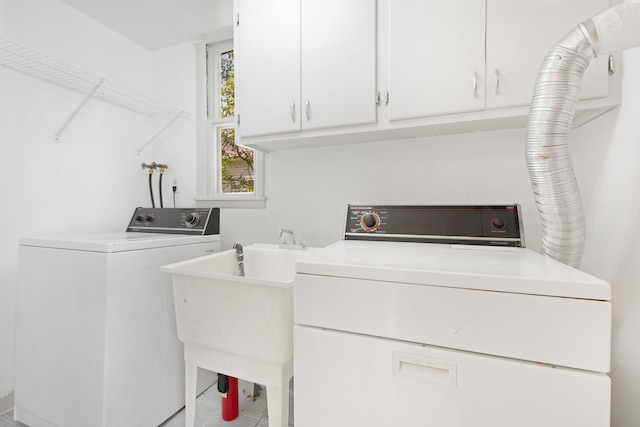 619 4th Ave E, Shakopee, MN 55379 - laundry area with cabinet space and washing machine and dryer