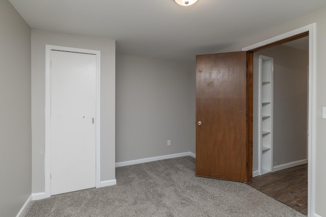 269 Chestnut St, Ellsworth, WI 54011 - unfurnished bedroom featuring carpet and a closet