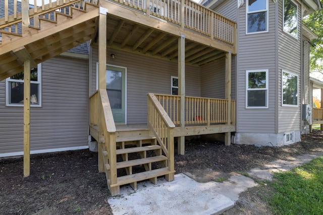 269 Chestnut St, Ellsworth, WI 54011 - doorway to property with a wooden deck