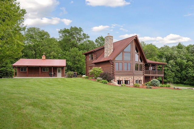 70824 227th St, Dassel Twp, MN 55325 - rear view of house with a chimney, log siding, and a lawn