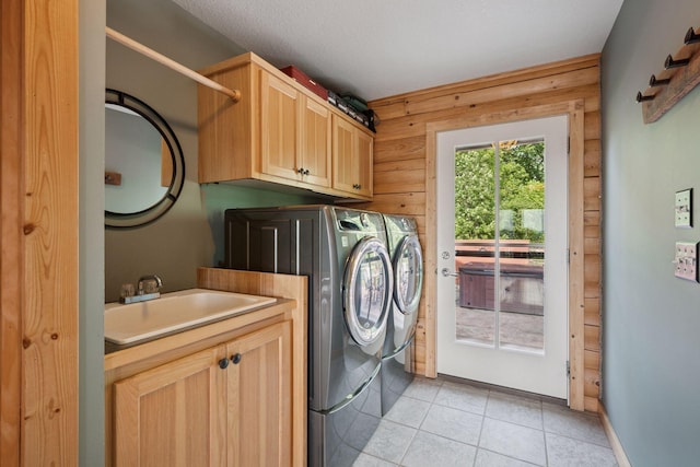 70824 227th St, Dassel Twp, MN 55325 - laundry area with cabinet space, independent washer and dryer, and light tile patterned floors