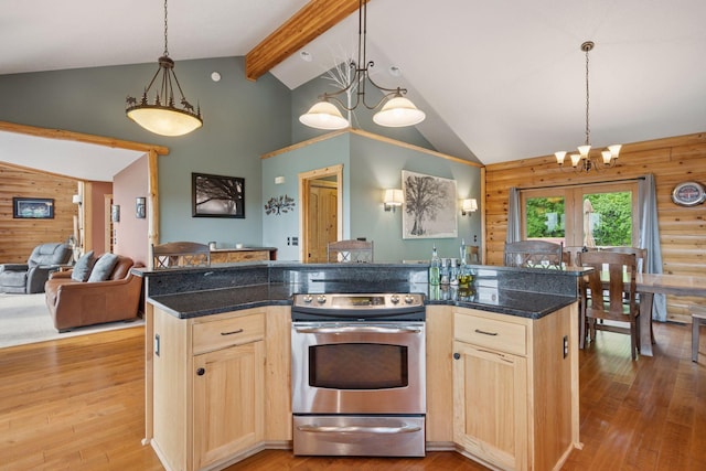 70824 227th St, Dassel Twp, MN 55325 - kitchen featuring stainless steel range with electric cooktop, light brown cabinets, a chandelier, open floor plan, and high vaulted ceiling