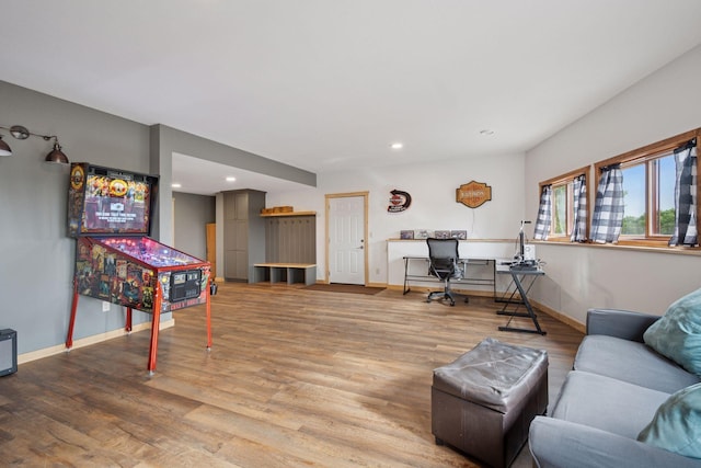 70824 227th St, Dassel Twp, MN 55325 - living room featuring wood finished floors, recessed lighting, and a desk