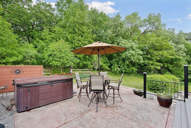 70824 227th St, Dassel Twp, MN 55325 - view of patio / terrace with a hot tub and outdoor dining space