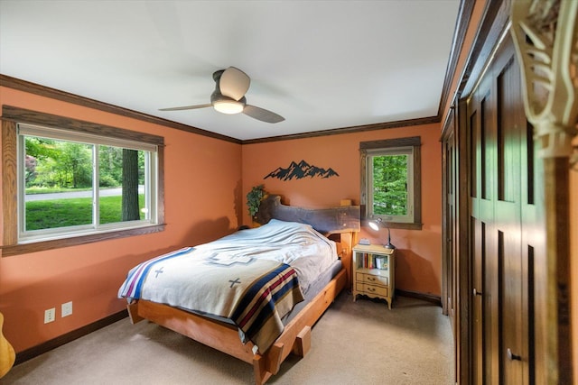 520 Wedgewood Ln N, Plymouth, MN 55441 - bedroom featuring multiple windows, crown molding, light carpet, and ceiling fan