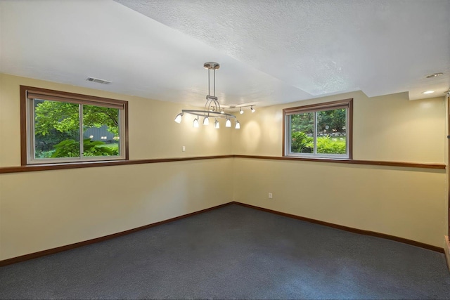 520 Wedgewood Ln N, Plymouth, MN 55441 - spare room with baseboards and dark colored carpet