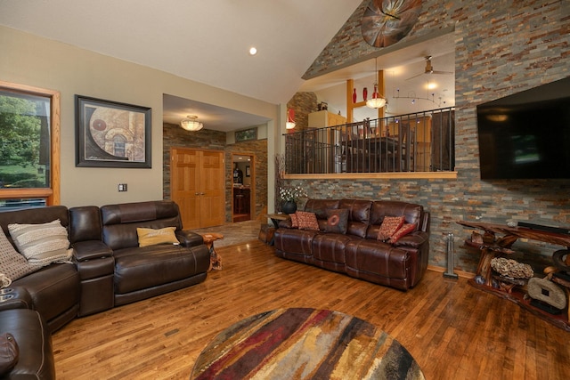 175 6th Ln NE, Oronoco, MN 55960 - living area featuring wood finished floors and high vaulted ceiling