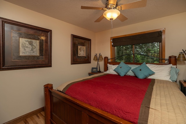 175 6th Ln NE, Oronoco, MN 55960 - bedroom with wood finished floors and ceiling fan