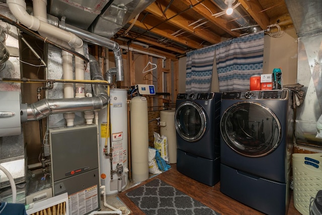 175 6th Ln NE, Oronoco, MN 55960 - washroom with water heater and washing machine and clothes dryer