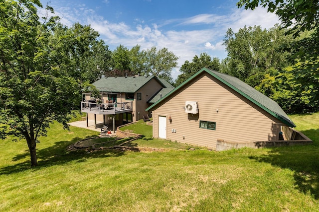 175 6th Ln NE, Oronoco, MN 55960 - back of property featuring a wooden deck and a yard