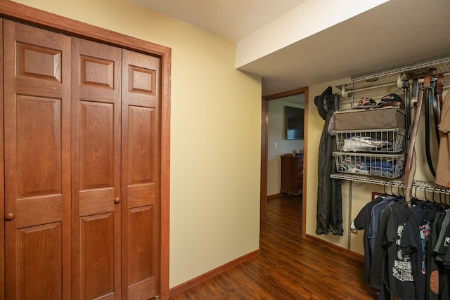 175 6th Ln NE, Oronoco, MN 55960 - hallway featuring dark wood-style flooring and baseboards