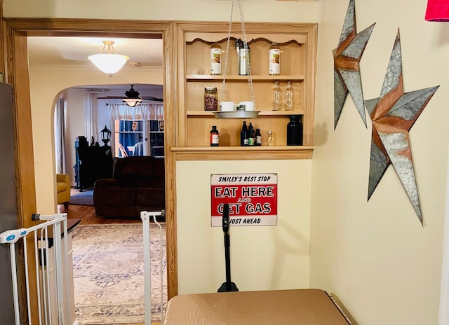 223 4th St, Virginia, MN 55792 - corridor with arched walkways and wood finished floors