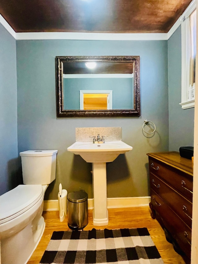 223 4th St, Virginia, MN 55792 - half bathroom with wood finished floors