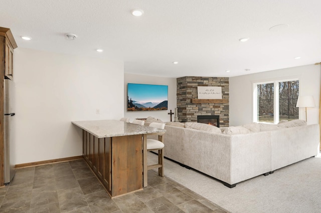 15359 Quamba St NE, Ham Lake, MN 55304 - living area with a fireplace and recessed lighting