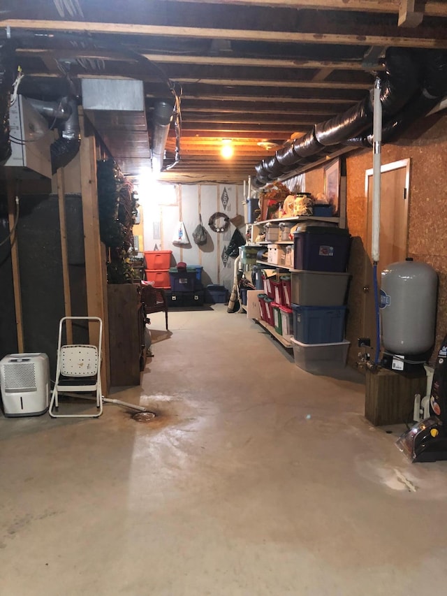 11160 Ottertail Point Dr NW, Cass Lake, MN 56633 - unfinished basement featuring a water pressure tank