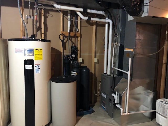 11160 Ottertail Point Dr NW, Cass Lake, MN 56633 - utility room featuring electric water heater and heating unit