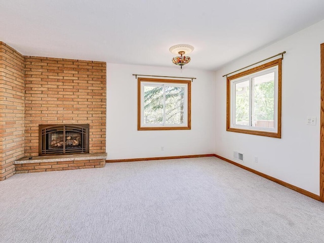 7651 86th St, Bloomington, MN 55438 - unfurnished living room with carpet flooring and a fireplace