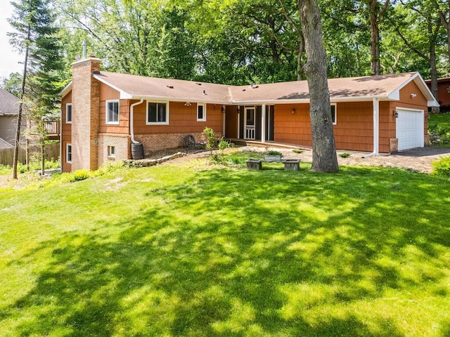 7651 86th St, Bloomington, MN 55438 - ranch-style house featuring a chimney, a front yard, and a garage