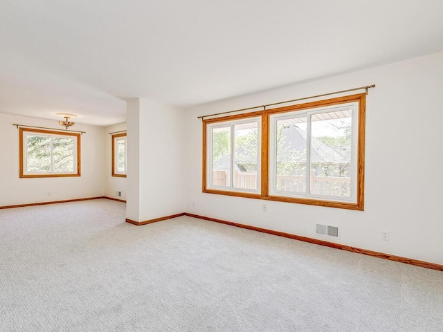 7651 86th St, Bloomington, MN 55438 - unfurnished room featuring light carpet and baseboards