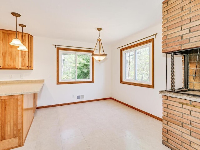 7651 86th St, Bloomington, MN 55438 - unfurnished dining area with baseboards