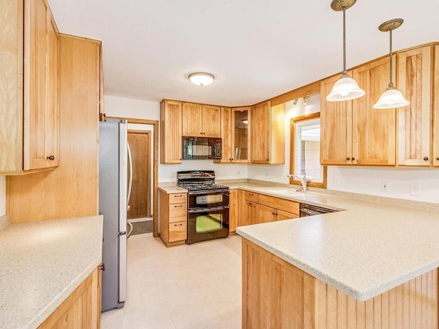 7651 86th St, Bloomington, MN 55438 - kitchen featuring black appliances, a peninsula, glass insert cabinets, hanging light fixtures, and light floors