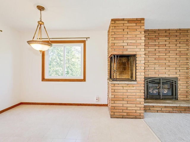 7651 86th St, Bloomington, MN 55438 - unfurnished living room featuring a brick fireplace and baseboards