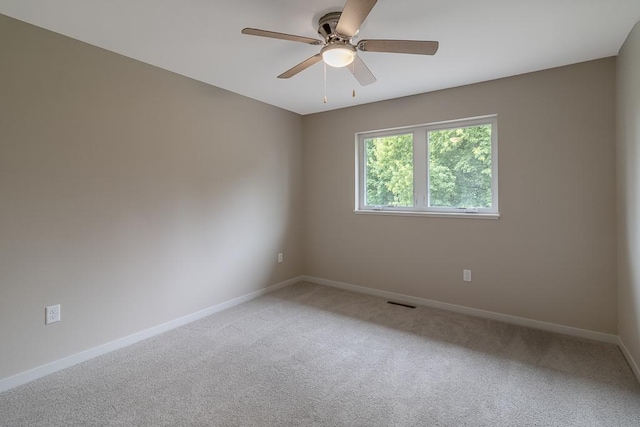 2216 Lake Ave, New Ulm, MN 56073 - unfurnished room featuring light colored carpet and ceiling fan