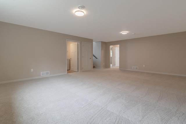 2216 Lake Ave, New Ulm, MN 56073 - spare room with light colored carpet and stairway
