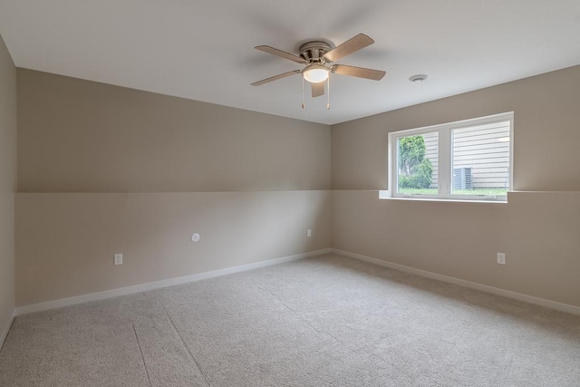 2216 Lake Ave, New Ulm, MN 56073 - empty room with a ceiling fan and light colored carpet