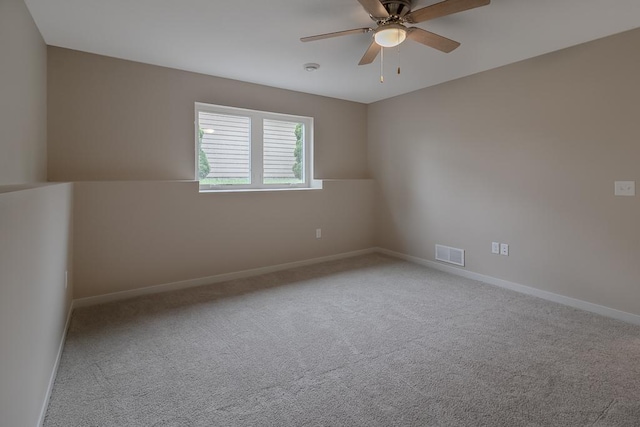 2216 Lake Ave, New Ulm, MN 56073 - spare room featuring carpet and ceiling fan