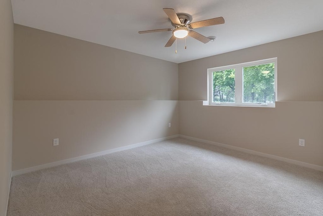 2216 Lake Ave, New Ulm, MN 56073 - unfurnished room featuring a ceiling fan and light colored carpet