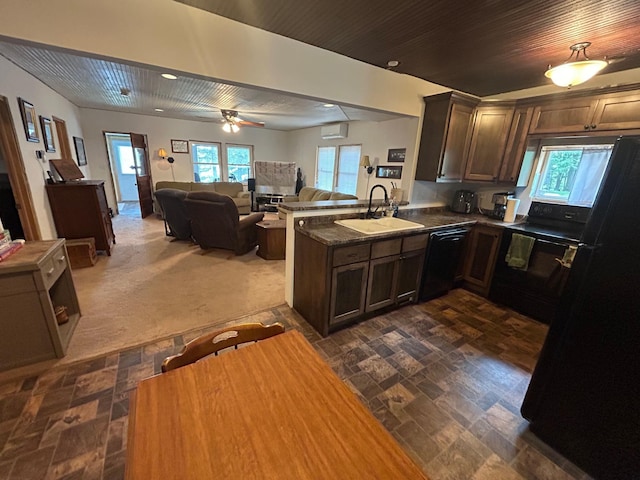 29184 Jana Rd, Scott Twp, WI 54830 - kitchen featuring black appliances, a peninsula, open floor plan, a wall mounted AC, and wood ceiling
