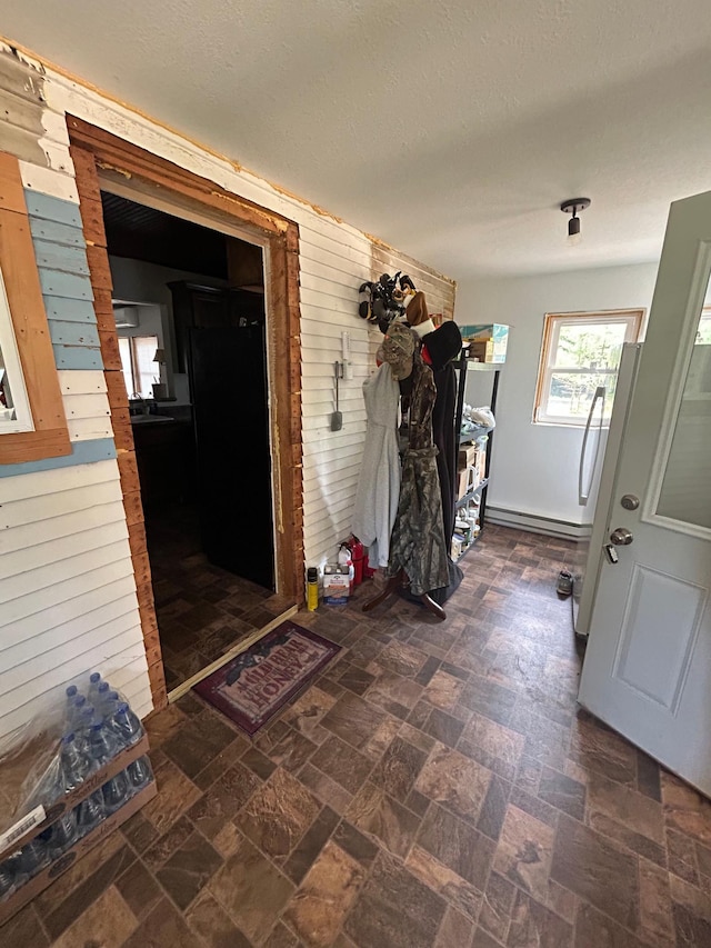 29184 Jana Rd, Scott Twp, WI 54830 - entrance to property with a baseboard heating unit