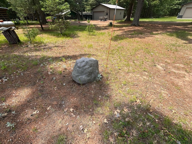 29184 Jana Rd, Scott Twp, WI 54830 - view of yard featuring an outbuilding