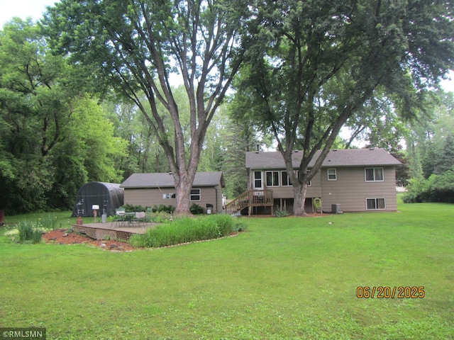 10445 215th Street Ct N, Scandia, MN 55073 - back of property with stairway, a patio area, a yard, and a deck