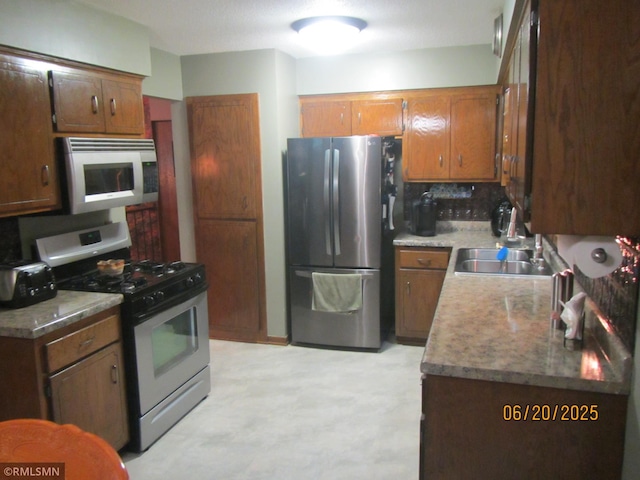 10445 215th Street Ct N, Scandia, MN 55073 - kitchen featuring stainless steel appliances and light floors