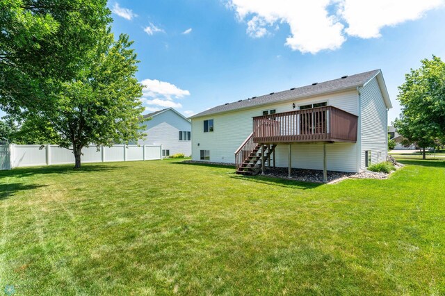 152 17th Ave W, West Fargo, ND 58078 - back of house with a wooden deck and stairway