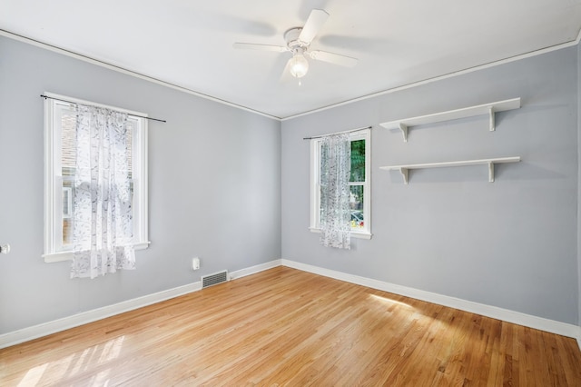 1215 Palace Ave, Saint Paul, MN 55105 - empty room with wood finished floors and ceiling fan