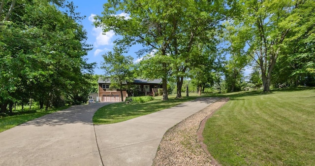 3170 Stark Rd, Fish Lake Twp, MN 55032 - view of property's community featuring driveway, a lawn, and a garage